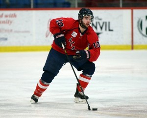 Defenceman Chris Owens, shown playing with the Acadia University Axemen last season, has received an invitation to attend the training camp of the American Hockey League’s St. John’s IceCaps next month. © Photo by Peter Oleskevich/Acadia University 